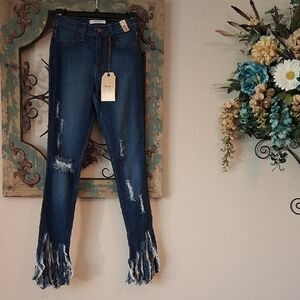 Vibrant Indigo Skinny Jeans with Fringed Ankles. NWT Size 7